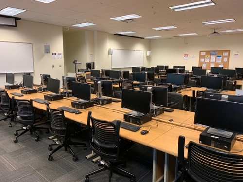 Rows of pc computers and wheeled chairs in the Baskin Engineering 109 lab