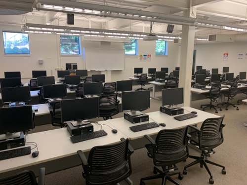 rows of chairs and computers in the soc sci 1 lab
