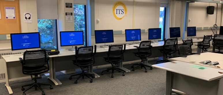 Rows of iMacs at College 8 computer lab